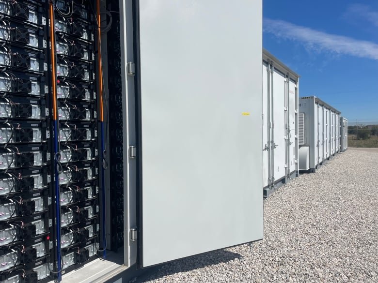 Shipping containers are packed with batteries to help increase Fort Worth's grid capacity.