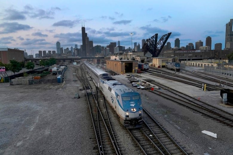 An Amtrak passenger train departs Chicago in the early evening headed south Wednesday, Sept. 14, 2022, in Chicago.