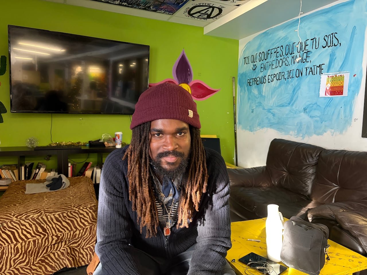 A smiling man facing the camera